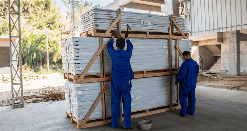 Bulk export packaging for solar mounting systems with palletized rails, packed clamps, cartons and container loading