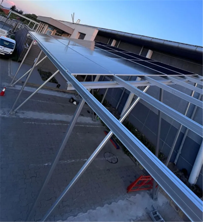 Solar carport mounting rail supporting PV modules above a parking canopy