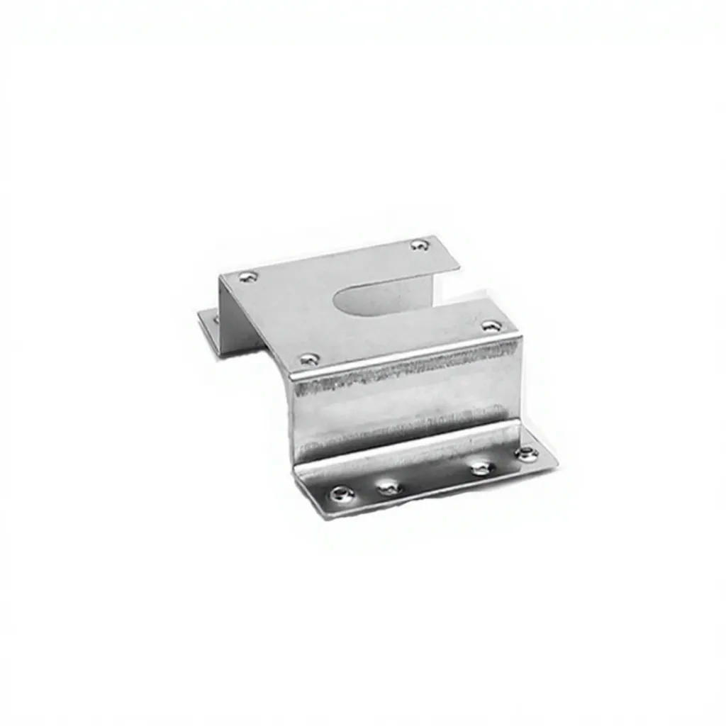 Solar grounding clip installed between a framed PV module and an aluminum mounting rail