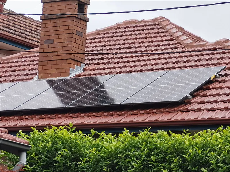 Tile roof solar mounting system with adjustable roof hooks, aluminum rails, module clamps and tile flashing