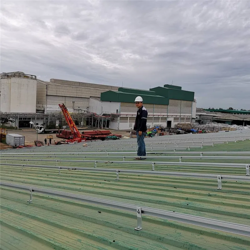 Solar panel mounting rails on a metal roof with L feet, hanger bolts and short-rail options