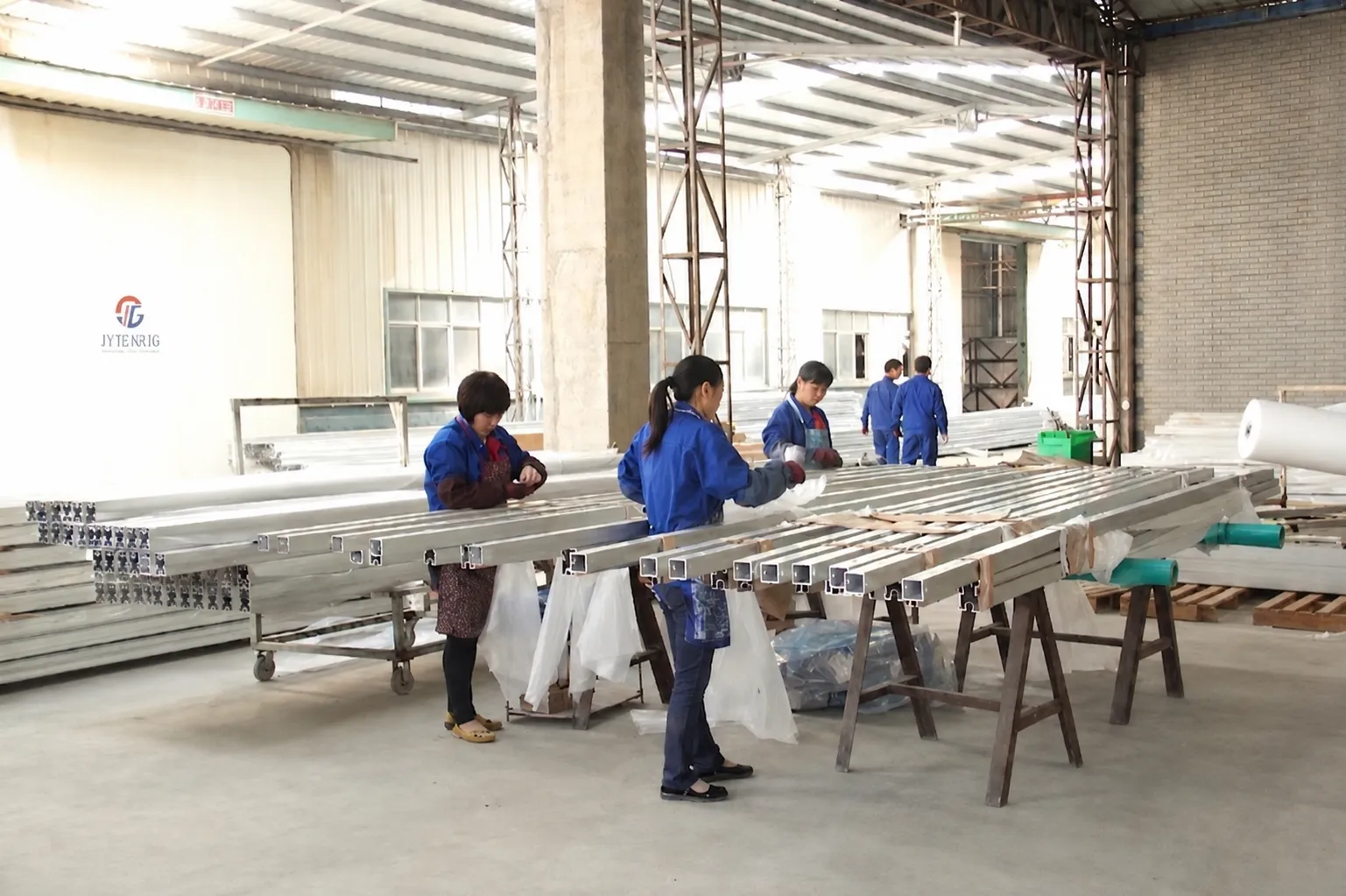 Pre-assembled fixed tilt solar racking components prepared for fast on-site installation