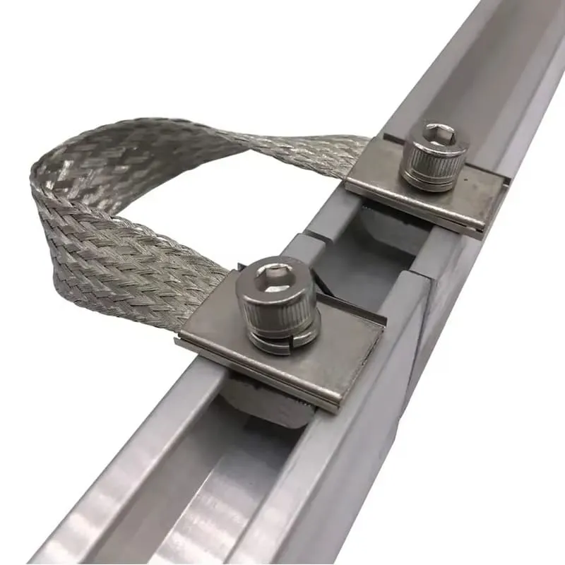 Bonding connector joining two aluminum solar mounting rail sections with a conductor