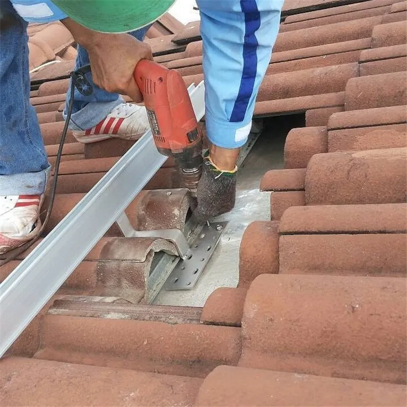 Adjustable solar roof hook connected to an aluminum mounting rail with a bolt and channel nut