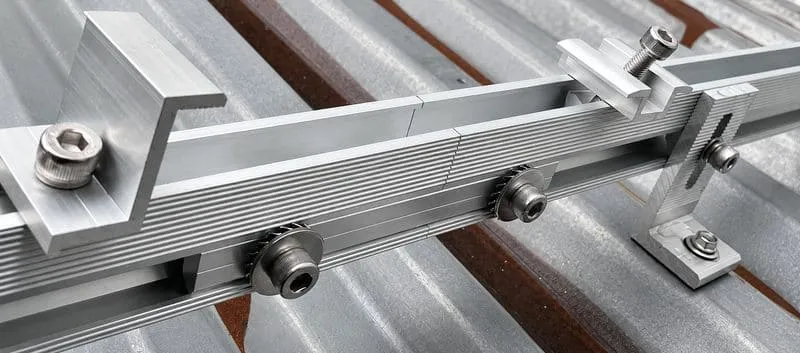 Aluminum solar mounting rail splice connector joining two PV rail sections