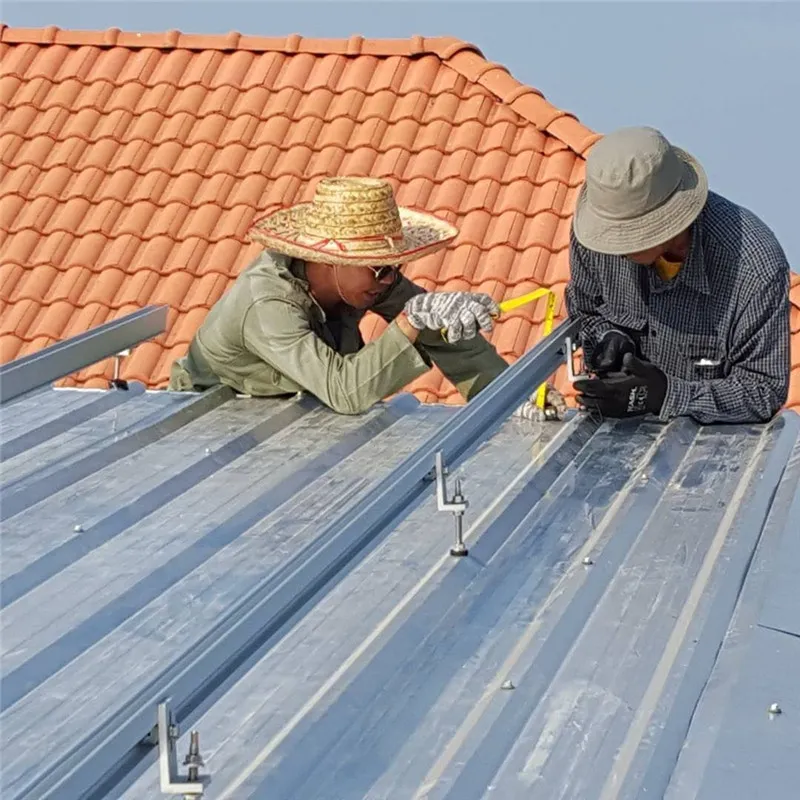 Solar panel mounting on a metal roof with rails, clamps, L feet, hanger bolts and EPDM washers