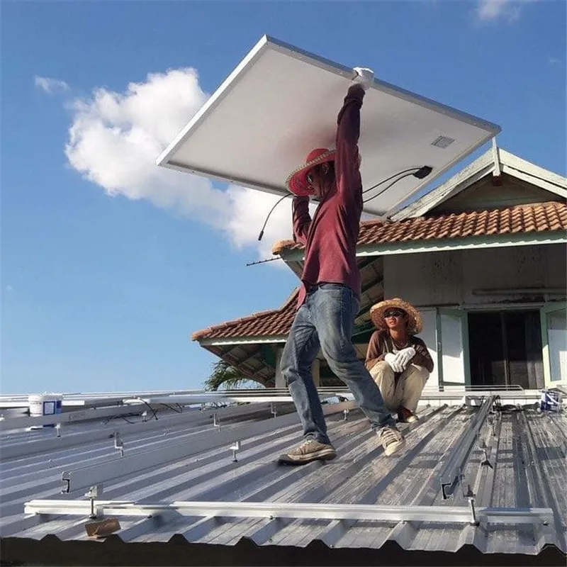 Exposed-fastened tin roof solar panel mounting system with L feet, rails and self-tapping screws