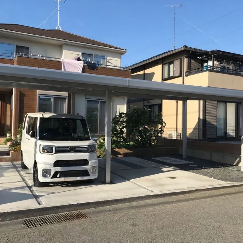 Waterproof solar carport mounting system with drainage channels and a photovoltaic canopy