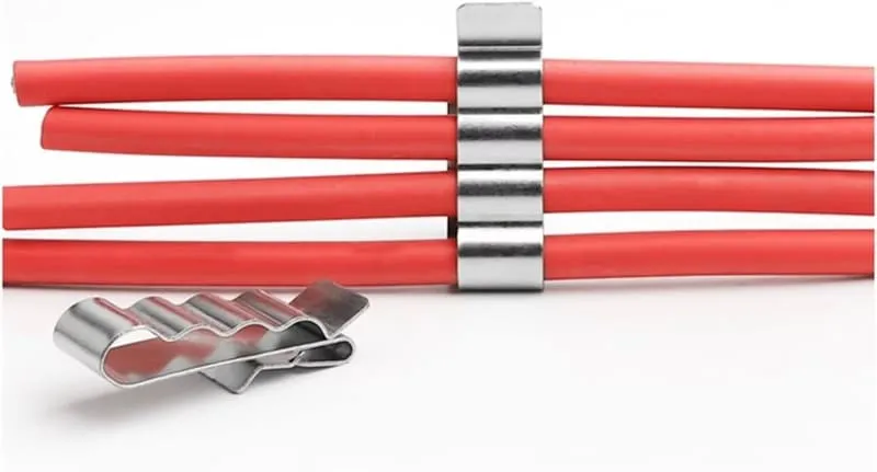 Multi-cable solar wire clip organizing several PV wires below a solar module