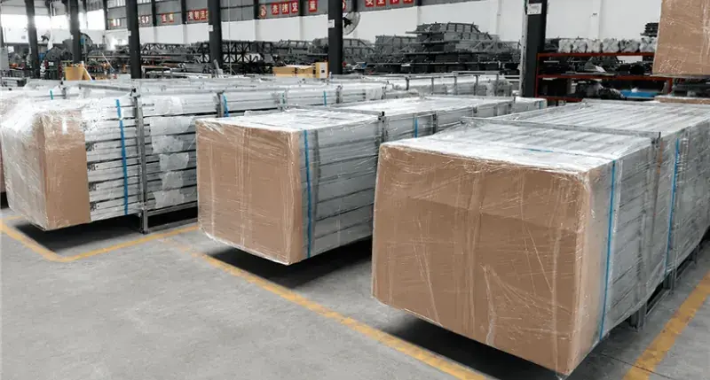 PV mounting hardware packed in cartons, rail bundles and project-labeled pallets